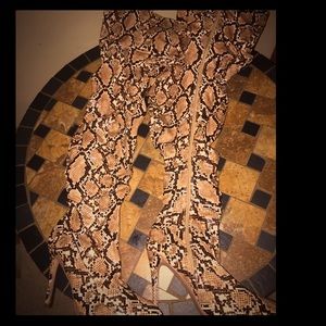 Thigh high snake skin inspired boots